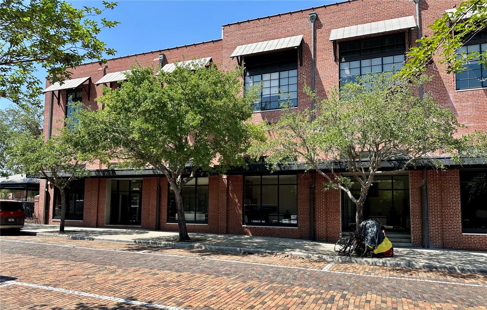 Discover this second-floor suite offering up to 1,850 square feet of versatile space in the vibrant, rapidly growing Historic Ybor City. This property presents unparalleled potential for businesses seeking immediate occupancy in a prime location. Whether you're relocating, launching a startup, or expanding an existing business, this opportunity is designed to accommodate a variety of commercial needs. Ideal uses for this space include professional offices, creative workspaces or artistic galleries. The owner seeks a 2 to 5-year lease with options for qualified candidates. This is a Gross lease, electricity, water, trash and CAM charges are included. Spacious & bright layouts, high ceilings, open configurations, and large windows allow for abundant natural light. Amenities include restroom facilities, secure on-site parking with two reserved spaces, elevator and wireless internet availability. Prime location features accessibility situated near the Cadrecha Plaza Trolley Station and streetcar routes, offering seamless access to local attractions and amenities. Walking distance, fine dining, shopping, lodging, banking, entertainment, and more. Just one block south of 7th Avenue and Nuccio Parkway, with quick access to major transit routes like I-275, I-4, Hwy 60, the Selmon Expressway, and Tampa International Airport. Surrounded by dynamic developments like Gas Worx, a 50-acre retail and residential project featuring new residences and restaurants, this property is located at the epicenter of Tampa's commercial and residential growth. Neighboring businesses include prominent names like Swope/Rodante Law Firm, Vangard Attorneys, ASD Architects, Hotel Haya, Hampton Inn & Suites & Centro Ybor. This is an exceptional opportunity for professionals, lawyers, educators, architects, consultants & artists to establish themselves in a thriving, highly desirable area. Ybor City's unmatched charm and continued development make it the perfect destination for your business. Call today to schedule a showing and secure your place in Historic Ybor City! Thank you.