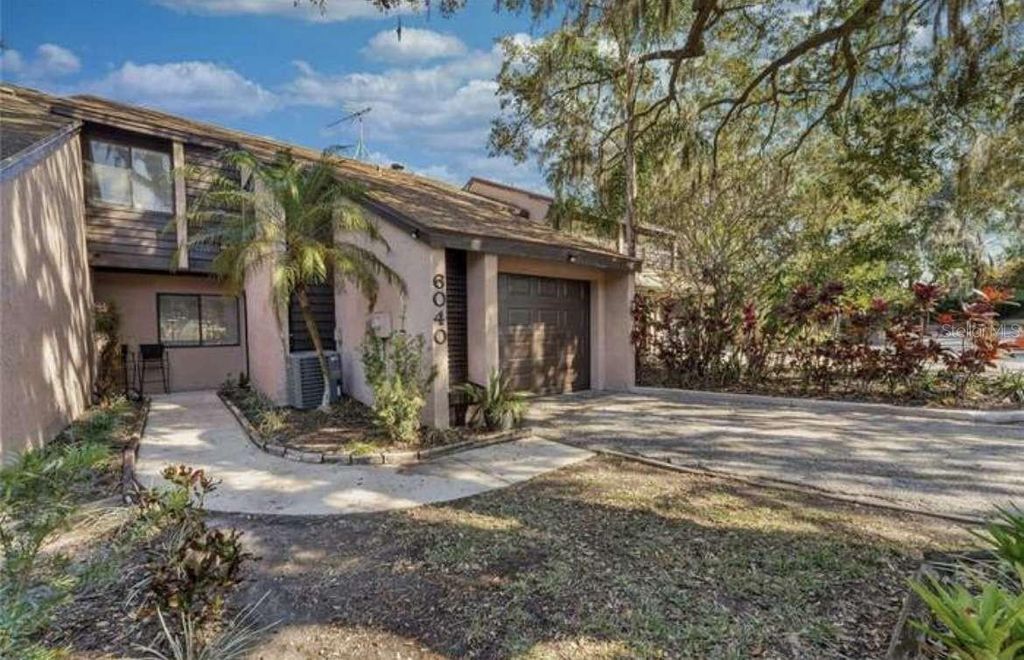 Photo of 6040 River Trace Road, Tampa, FL 33617 (MLS # TB8410278)