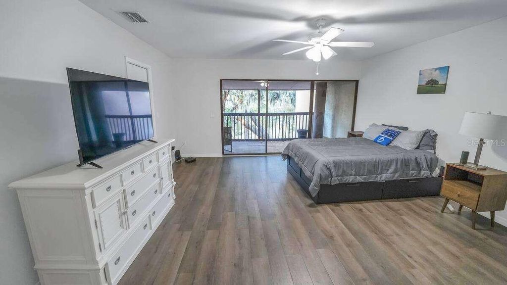 Photo of 6040 River Trace Road, Tampa, FL 33617 (MLS # TB8410278)
