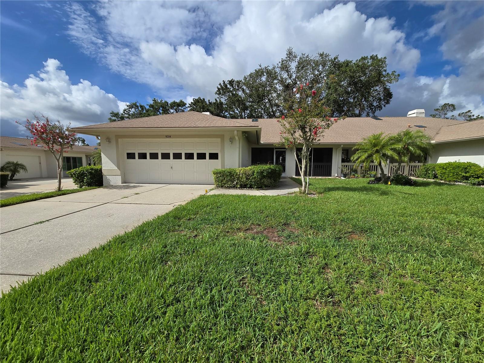 Large and lovely Villa in the Seven Springs Golf & Country Club! Such a spacious interior, with 2 bedrooms, 2 baths, a large bonus area, living/dining combo, eat-in kitchen, an interior laundry room, and a 2 car attached garage. This lovely 2224 square foot condominium is located in the heart of Trinity, with so many choices for shopping and dining out. within a stones throw! The home is available for move in, after becoming approved by the owner and the association. Sorry, no smoking allowed. Pets may possibly be considered, on a case by case basis; a non-refundable pet fee would apply. This is a large two bedroom, two baths, two car garage home, with a very large bonus room that spans between the side of the living room to the master bedroom, which could be used as an office, hobby room, den, or whatever your heart desires. The master bedroom has an ensuite bath, with a walk-in shower, Jack and Jill sinks, with a very large walk-in closet. The second bedroom is next to the adjacent guest bath, with a walk-in shower. There is an indoor laundry room off of the attached 2-car-garage, with the laundry room having a built-in ironing board. You can have access to the Country Clubs ammenities under the owners membership after paying a one time small fee, which offers access to many ammenities, such as the golf course, clubhouse, restaurant, gym, pool, pickleball, bocce, billiards, the library, and scheduled monthly events. Grab your favorite agent to set up a showing today!