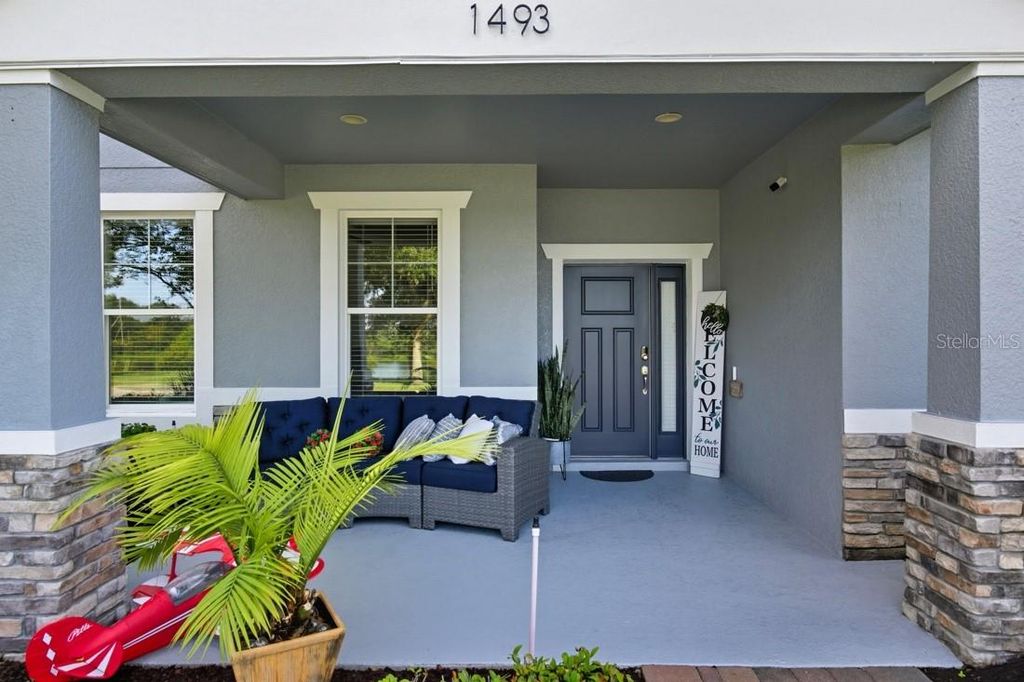 Photo of 1493 Reflection Cove, Saint Cloud, FL 34771 (MLS # O6357906)