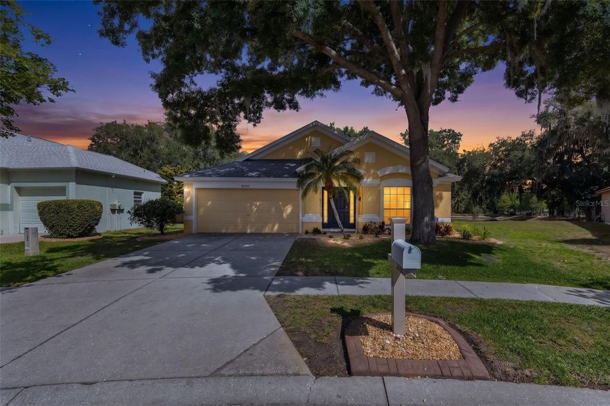 Under contract-accepting backup offers. Welcome to your new home. Nestled in the gated community of Ammanford within Meadow Pointe III, this Wesley Chapel home sits on an oversized lot that offers more room to breathe than you'll find in typical neighborhood homes. A mature oak tree frames the property, and the screened lanai opens directly to a peaceful conservation and pond view. The kind of backdrop that makes morning coffee feel like a small luxury and weekend afternoons on the lanai feel unhurried. With four bedrooms, there's room to grow. Whether you're a growing household, or you need space for guests and a home office, this home adapts to how you actually live. The recent updates are already done for you: fresh exterior paint (2026), a newer roof (2022), updated HVAC system (2023), and brand new kitchen appliances including refrigerator, range, microwave, and dishwasher (2025). No projects waiting. Just move in and start making memories. Living within Meadow Pointe III means you're surrounded by resort style amenities: pools, tennis courts, pickleball, basketball, shuffleboard, beach volleyball, fitness center, playgrounds, and walking trails, all within the community. The gated Ammanford neighborhood adds security and peace of mind. And you're central to everything Wesley Chapel offers: shopping, dining, medical centers, and easy highway access. At this price point in this location, this won't last long.