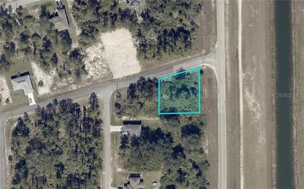 Photo of 3539 Sunshine Boulevard, Lehigh Acres, FL 33971 (MLS # A4675545)
