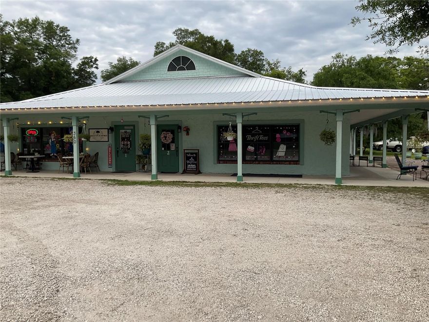 Great building with 4 apartments or could be offices. Two front facing commercial stores
New Metal Roof.  Freshly painted
Avvg income $6500 per month