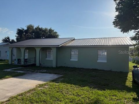 Photo of 410 5th Street S, Dundee, FL 33838 (MLS # O6310089) Photo of 410 5th Street S, Dundee, FL 33838 (MLS # O6310089)