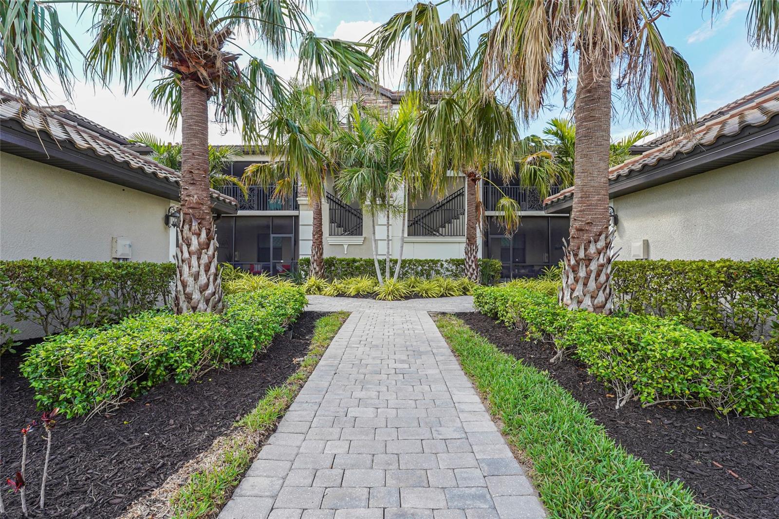 GOLF MEMBERSHIP INCLUDED — TURNKEY & FURNISHED!
Live the ultimate Florida lifestyle in this beautifully maintained 2-bedroom + den, 2-bath second-floor Veranda condo, perfectly positioned on the first hole of the Commander Course at Lakewood National, an Arnold Palmer-designed championship course ranked #1 in Florida by Golf Advisor.
Step inside and enjoy an open-concept layout with expansive panoramic golf course views and two screened lanais—ideal for savoring morning coffee or evening sunsets. The chef’s kitchen is designed for both functionality and style, featuring solid wood cabinetry, granite countertops, stainless steel appliances, and a spacious center island with counter-height seating.
The primary suite is a light-filled retreat with a walk-in closet plus an additional closet, and an en-suite bath offering dual vanities and a walk-in shower. The split floor plan places the guest bedroom at the front of the home for added privacy. The flexible den provides the perfect space for a home office or additional sleeping area.
As a resident of Lakewood National, you’ll enjoy a maintenance-free lifestyle and a full golf membership granting access to TWO Arnold Palmer-designed golf courses, a newly completed 28,000 sq ft clubhouse, resort-style pool with waterfalls, poolside Tiki bar and café, full-service spa, state-of-the-art fitness center, group classes including yoga, tennis and pickleball courts, bocce ball, multiple satellite pools, and more—all within a gated, amenity-rich community in one of Southwest Florida’s most sought-after locations.
Whether you’re looking for a seasonal getaway, full-time residence, or a lucrative investment, this condo offers it all—luxury, location, and lifestyle.
