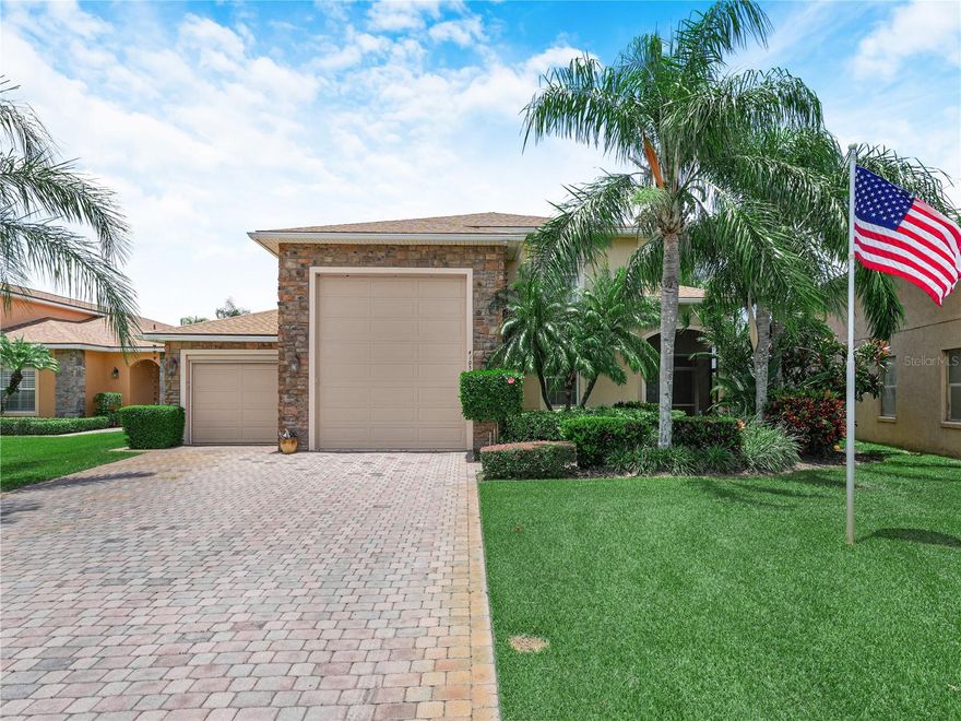 Stunning and sprawling lake, canal and golf course views will keep you transfixed on all the natural birds and wildlife calling Lake Ashton home. Keep the Binocular's close by!!!  This beautiful 3 bedroom, 3 full bath RV HOME is located on the highly sought after Limerick Drive in Lake Ashton, a gated Florida Retirement, 55+ community with resort style amenities and activities. Offering excellent curb appeal with mature landscape, exterior stone work, screened front entry and paver drive way, this Magellan RV floor plan home is SOMETHING TO TALK ABOUT!  ****IMPROVEMENTS TO THIS HOME INCLUDE: NEW A/C UNIT (2025) in the Primary Living Area and  NEW ROOF (2023). CDD DEBT HAS BEEN PAID IN FULL- SAVING YOU THOUSANDS***      Enter into the foyer of this home thru a stylish leaded glass door and step into the main living area with volume ceilings that enhance the open and airy feeling of this home.  This free flowing floor plan provides easy access between the living room, kitchen and extended living areas. The modern kitchen with granite counter tops, tiled backsplash, under cabinet lighting, 42" cabinets and breakfast bar is perfectly positioned in the home.  The Primary and Guest Bedrooms are downstairs, while the 3rd bedroom with full bath and loft area are upstairs, ideal for guests!  Sliding glass doors separate the living room from the extended Air Conditioned Florida Room with tile floors, walls of windows, pull down shades and vaulted ceiling. Wood beams add a touch of class! From the A/C Florida room you can access a separate Screened/Covered lanai with tile floor and a separate Outdoor Paver Pad. All three areas are desirable destinations in this home. They are comfortable, peaceful and beautiful! Cast a line while standing on the outdoor paver pad. The canal on the rear of the home is an extension of Lake Ashton- you'll have so much fun fishing or simply enjoying the scenery. Conveniently located off the LR is the comfy Primary Bedroom. It's the perfect place to unwind after a long day.  The en-suite offers a walk-in shower, comfort height double sink vanity with an abundance of cabinetry/drawers, walk in tub and walk in closet with ample space. Additional home highlights include a loft area with built-in cabinets for storage, EUCALYPTUS WOOD FLOORS in the Main Living Area, Guest Bedroom and Primary Bedroom. The RV Garage with tandem two car garage has hook ups, a workspace and loft area with electric lift - making this space a pleasant working environment. There is an automatic screen on the tandem  two car garage door. The indoor laundry area is located in the hallway adjacent to the Guest full bath downstairs. This Beautifully landscaped, stately and majestic home is waiting for its NEXT Owner. Lake Ashton, a gated 55+ community, offers 36 Holes of Golf (Membership Optional), Clubhouse with Grand Ballroom, movie theater, bowling lanes, fitness center, restaurant, outdoor temperature controlled pool, Bocce, tennis courts, shuffleboard courts, card, craft and billiard rooms and MORE. There is also a separate Health and Fitness Center with indoor temperature controlled lap pool, fitness center, pickleball courts, indoor basketball and indoor racquetball, large multi-purpose room and More! CALL YOUR AGENT TODAY TO SCHEDULE A PERSONAL TOUR OF THIS HOME... YOU'LL BE GLAD YOU DID!