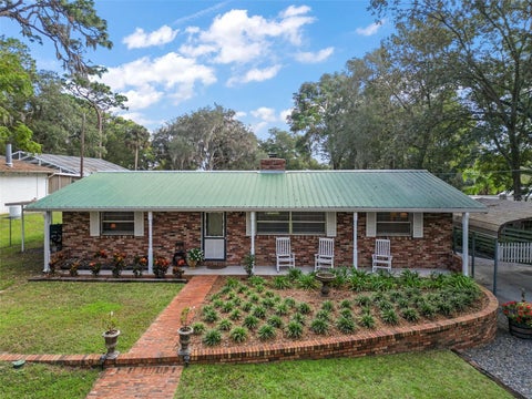 Photo of 10303 SE Sunset Harbor Road, Summerfield, FL 34491 (MLS # G5115470)
