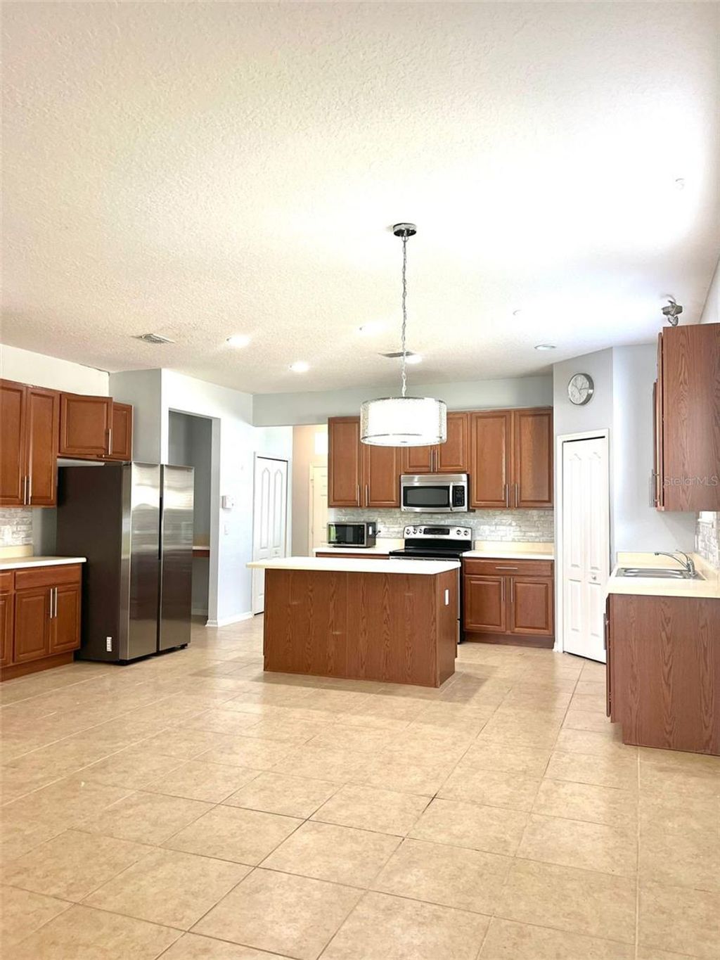 Photo of 5588 Sycamore Canyon Drive, Kissimmee, FL 34758 (MLS # S5139538)