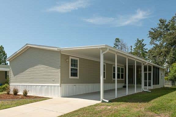 Photo of 9343 Scepter Avenue, Brooksville, FL 34613 (MLS # TB8538467)