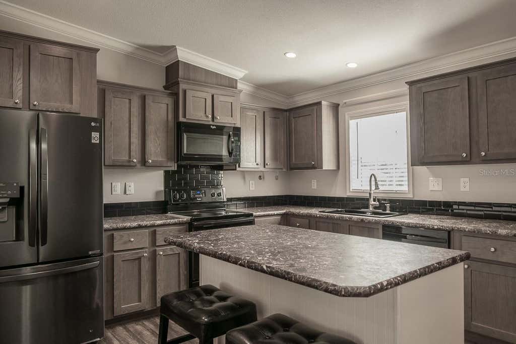 Photo of 9343 Scepter Avenue, Brooksville, FL 34613 (MLS # TB8538467)
