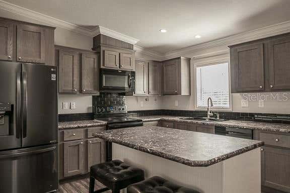 Photo of 9343 Scepter Avenue, Brooksville, FL 34613 (MLS # TB8538467)