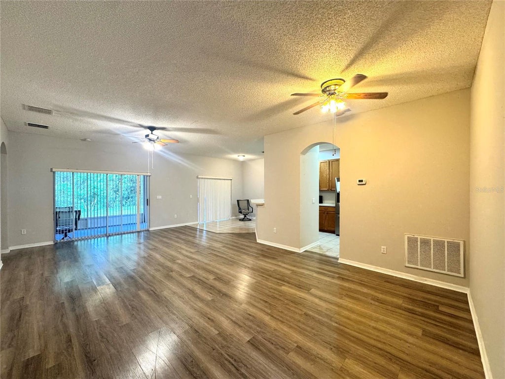 Photo of 5716 Port Concorde Lane, Orlando, FL 32829 (MLS # O6441716)