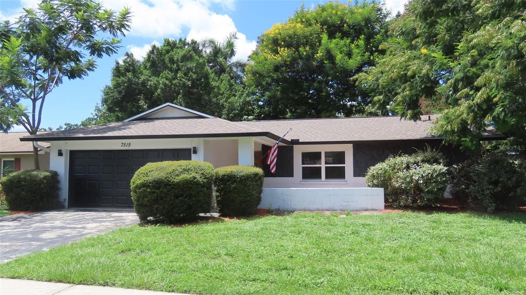 Photo of 7515 Winging Way Drive, Tampa, FL 33615 (MLS # TB8539328)