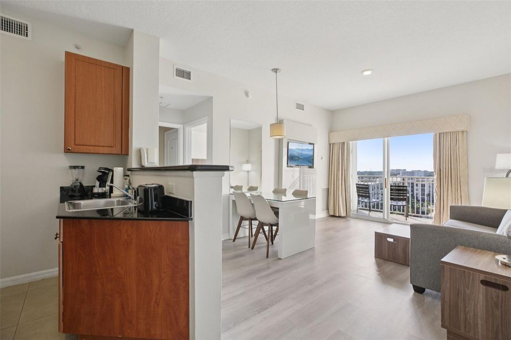 Photo of 7395 Universal Boulevard #905, Orlando, FL 32819 (MLS # O6363193)