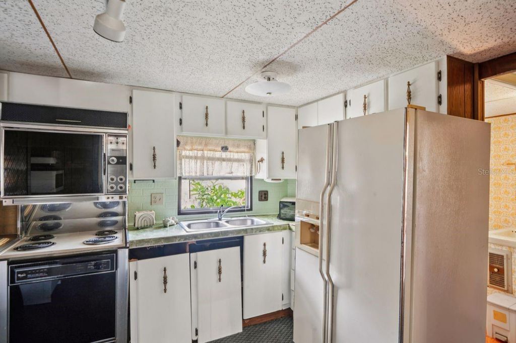 Photo of 9310 Kiowa Dr, New Port Richey, FL 34654 (MLS # W7881047)