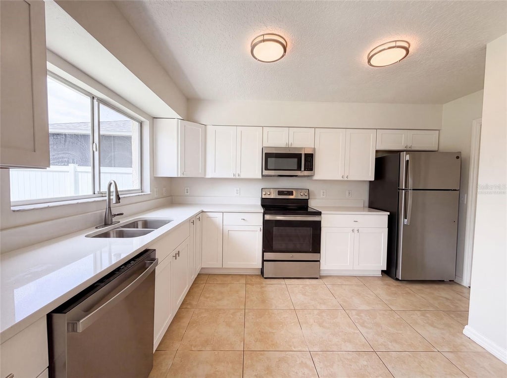 Photo of 13236 Pike Lake Drive, Riverview, FL 33579 (MLS # O6430198)