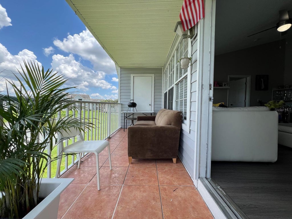 Photo of 1213 Bermuda Lakes Lane #208, Kissimmee, FL 34741 (MLS # S5157399)
