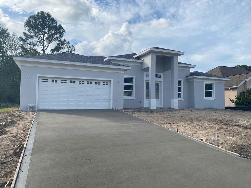 Photo of 45 Farmsworth Drive, Palm Coast, FL 32137 (MLS # FC312695)