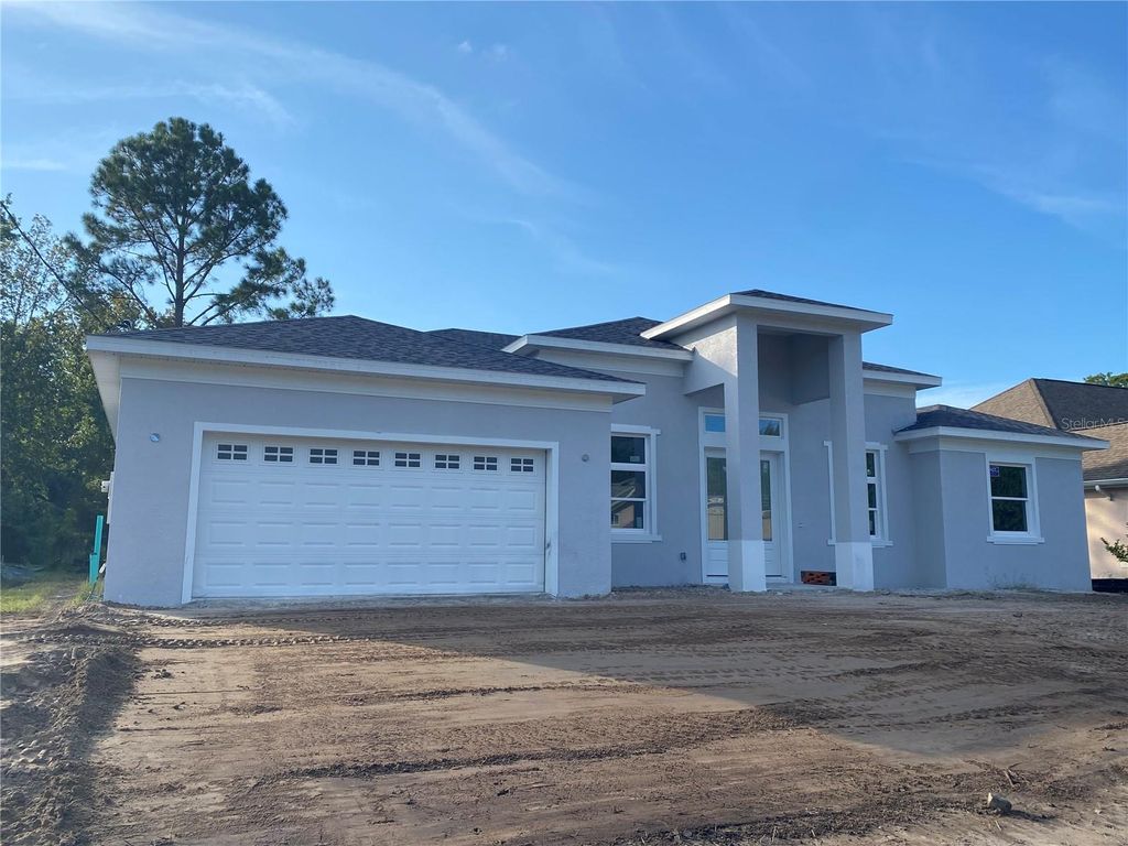 Photo of 45 Farmsworth Drive, Palm Coast, FL 32137 (MLS # FC312695)
