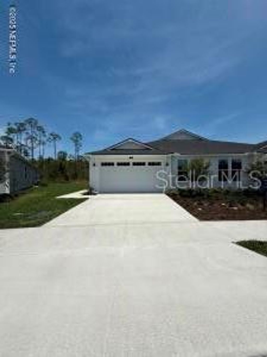 Photo of 38 Mulberry Road, Palm Coast, FL 32164 (MLS # FC312606)