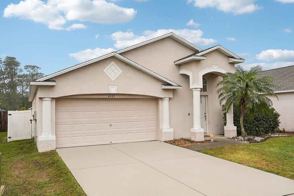 Photo of 6325 Chapel Pines Boulevard, Wesley Chapel, FL 33545 (MLS # TB8341772)