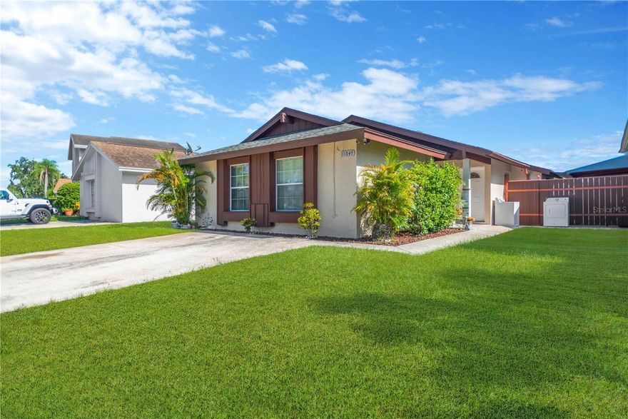 One or more photo(s) has been virtually staged. Welcome to your dream home in Carrollwood! This stunning property with 3 beds, 3 baths, boasts many upgrades, ensuring comfort, efficiency, and peace of mind for years to come. Step inside to discover new kitchen cabinets, bathrooms, and countertops, among many others. The open concept layout seamlessly connects the beautiful kitchen and living room area, offering a sleek and modern look. Highly regarded schools, convenient shopping and dining options, and quick access to major highways for effortless commuting. Step outside and unwind near the pond—perfect for entertaining, letting pets play, or just enjoying some quiet time. This home is not just a purchase; it's an investment in your future. Don't miss out on the opportunity to call this house your home sweet home. Schedule your showing today!