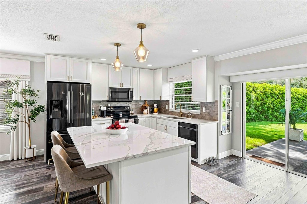 Photo of 16642 Vallely Drive, Tampa, FL 33618 (MLS # W7889143)