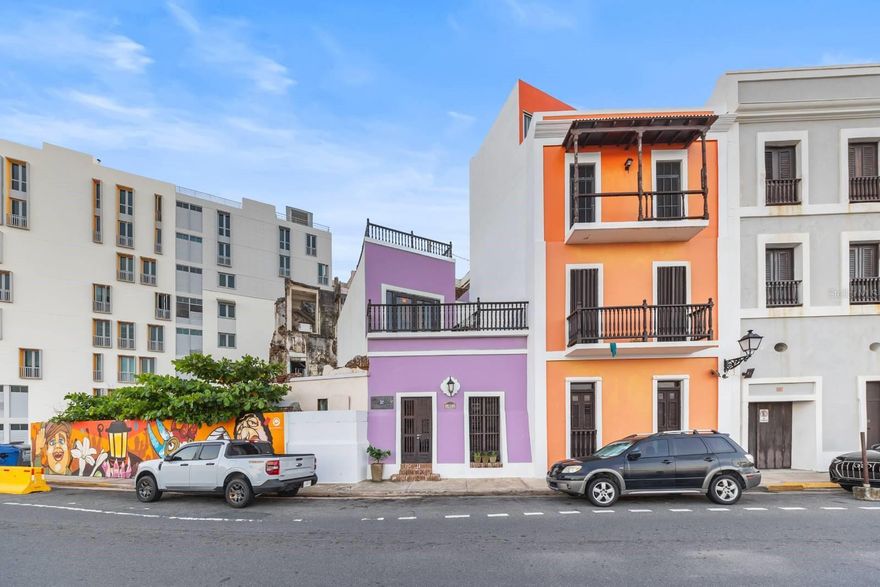 Historic Colonial Home with Ocean Views on Norzagaray Street, Old San Juan
Approx. 2,500 SF | 2 Beds | 3 Baths | Rooftop Terrace | Dual Access 

Located on iconic Norzagaray Street in the heart of Old San Juan—steps from San Cristóbal Fort—this rare three-story colonial residence offers panoramic Atlantic Ocean views and unmatched character. Originally built in the 1600s and thoughtfully restored, the property blends historical charm with modern comfort.

Key Features:

Approx. 2,500 SF of total living and outdoor space

Dual private access from Norzagaray and Sol Streets

First Floor: Living room, family room, kitchen, full bath, and interior patio with ocean views

Second Floor: Two spacious bedrooms, both with en-suite bathrooms; the primary suite includes ocean-facing balcony and walk-in closet

Third Floor: Expansive rooftop terrace with panoramic views of San Cristóbal Fort, the city walls, and the Atlantic

Additional Space: 1800s stone water cistern with potential for conversion (wine cellar, office, studio)

Cathedral ceilings and marble floors sourced from Juana Díaz, PR

Exceptional cross-ventilation and natural light throughout

Zoned for residential use with short-term rental potential; eligible for historic district tax incentives

Location Highlights:
Situated within a UNESCO World Heritage Site, this home is walkable to Old San Juan’s best restaurants, shops, historic sites, and cultural venues. A short drive connects you to Condado, Miramar, and the airport (SJU).