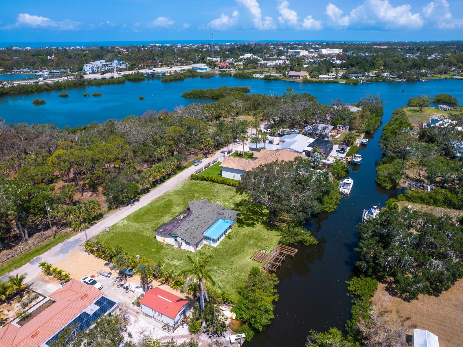 Discover a rare opportunity with over a half-acre waterfront lot at 606 Bittner Blvd., offering direct access to the Gulf of Mexico via scenic Dona Bay. On a quiet dead-end street with no through traffic, this serene location is ideal for your dream home or a complete rebuild. Enjoy top-rated schools, proximity to world-class beaches, dining and shopping, plus quick access to Interstate 75 for easy commuting. This is coastal Florida living with unmatched potential.