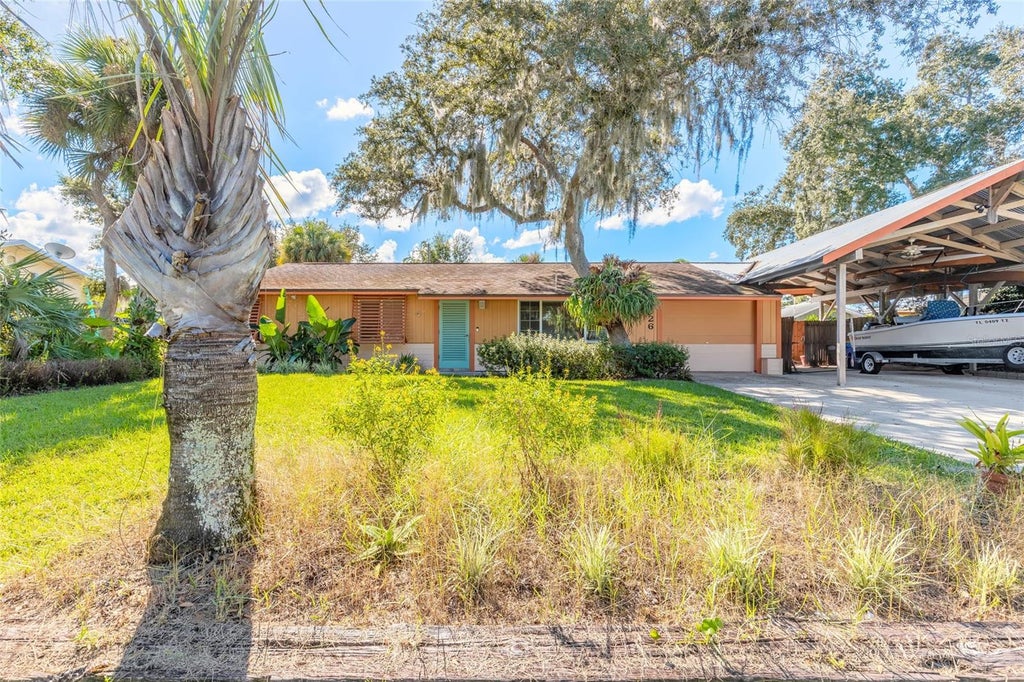 Photo of 2526 Royal Palm Drive, Edgewater, FL 32141 (MLS # NS1089399)