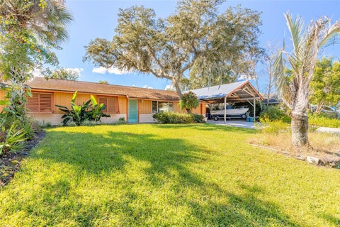 Photo of 2526 Royal Palm Drive, Edgewater, FL 32141 (MLS # NS1089399)