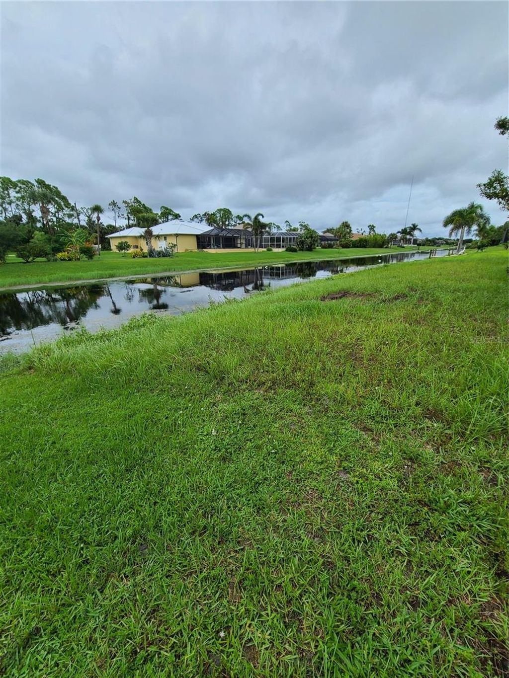 Photo of 254 Long Meadow Lane, Rotonda West, FL 33947 (MLS # D6133301)