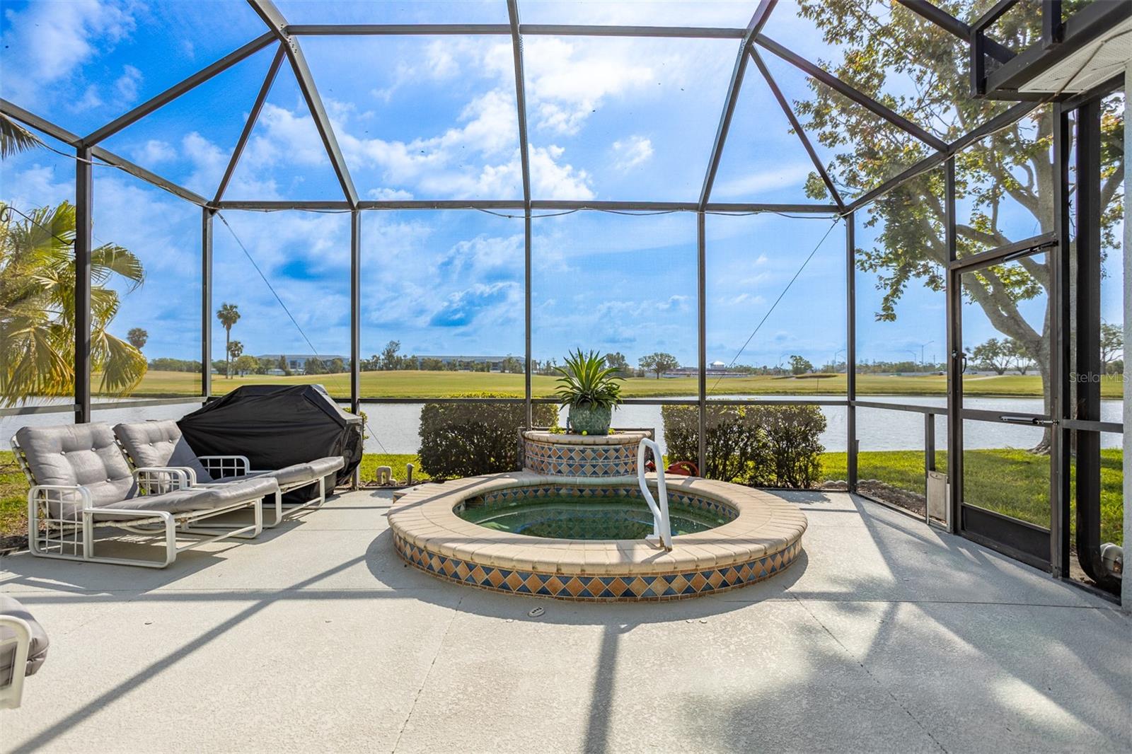 One or more photo(s) has been virtually staged. Over $67000 has been spent on improvements and upgrades in the last 3 years on this modern, energy-efficient and turn-key home located adjacent to Lakewood Ranch in the Greenfield Plantation Golf Community (NO CDD fees). Owner will contribute up to $4000 toward closing costs. This home is a MUST SEE.
Upon entering, you are welcomed into an open-concept plan, filled with the Florida sun. From the multitude of windows and sliders, you can watch the sun rise over the horizon and pond of the golf course. You may even see one of Florida's many birds.
Energy-efficiency is an understatement for this house as the 25 solar panels cover almost all of the average electricity costs
Inside, the kitchen was recently renovated and includes all new stainless steel appliances, an island, granite countertops with marble backsplash and lots of storage. Both bathrooms have also been recently upgraded. The large master bedroom ensuite contains a large walk-in shower, separate toilet room, double sinks and a walk-in closet. The entire house has wall-to-wall hardwood and tile flooring and neutral paint colors and all rooms are spacious..
An oasis waits for you outside with a large lanai and heated in-ground spa. The grounds and flower beds are well maintained. There is also a large 2-car garage with lots of storage. This home is on a quiet street with sidewalks.
For a low homeowners fee, this community also contains a pool that is just around the corner from the house.
Newer structural elements and utilites are additional benefits for this house. HVAC (2020) with a 10 year parts and labor warranty, roof (2022), electric hot water heater (2020), exterior paint (2022) and spa heater and controls (2022). In addition, natural gas is available for the hot water heater, HVAC and range.
The elementary school, Freedom Elementary and middle school, Haile Middle School are a short walk! AND, a short drive away, you will find ample shops, restaurants, gas stations, convenience stores, medical facilities and more! With an easy commute to beaches, Sarasota and Lakewood Ranch, you can't ask for more.
Don't miss this one. Realtor is owner.