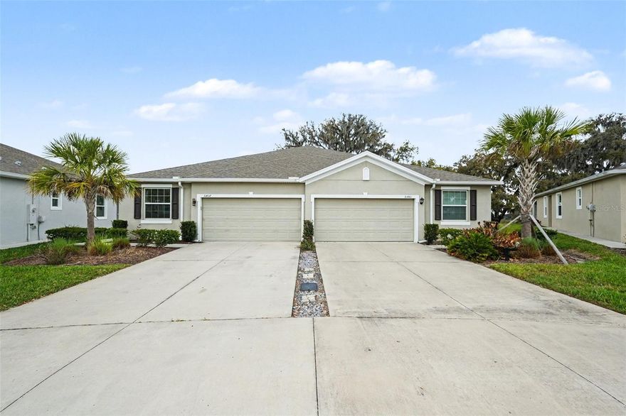 One or more photo(s) has been virtually staged. LIVE like you are on VACATION everyday in this Stunning Siesta floorplan villa in Mirada! This 3 bedroom, 2 bath, 2-car garage home offers 1,587 sq. ft. of living space on a rare OVERSIZED 10,000 sq. ft. pie-shaped PREMIUM lot with CONSERVATAION and WATER views. Features include lofty 9'4" ceilings, 18" tile in main areas, French doors to a flex/office, tray ceiling in the primary suite, and a screened lanai with breathtaking sunsets! The gourmet kitchen shines with 42" espresso staggered cabinets with crown molding, granite counters, subway backsplash, and stainless Whirlpool appliances. Additional upgrades: smart home system, washer/dryer with storage, new lighting, and garage shelving. Built by D.R. Horton, this villa was carefully designed with a bright open layout which makes entertaining a breeze. Tropical Bahama decor in the casually elegany primary suite features a tray ceiling, large windows overlooking conservation, plus a spa-like bath with granite counters, rubbed oil bronze fixtures, and ample storage. Additional upgrades include new lighting and ceiling fans, shelves added in the garage, and a utility closet with washer/dryer and overhead storage. The screened lanai offers breathtaking sunsets and serene views of two ponds and conservation, creating the perfect outdoor retreat to REST EASY! This smart home comes Continued... See Addendum Public Remarks 1