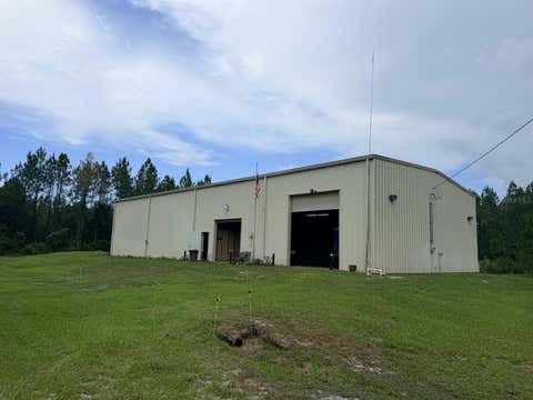 Photo of 790 NW 42 Terrace, Chiefland, FL 32626 (MLS # GC541238)