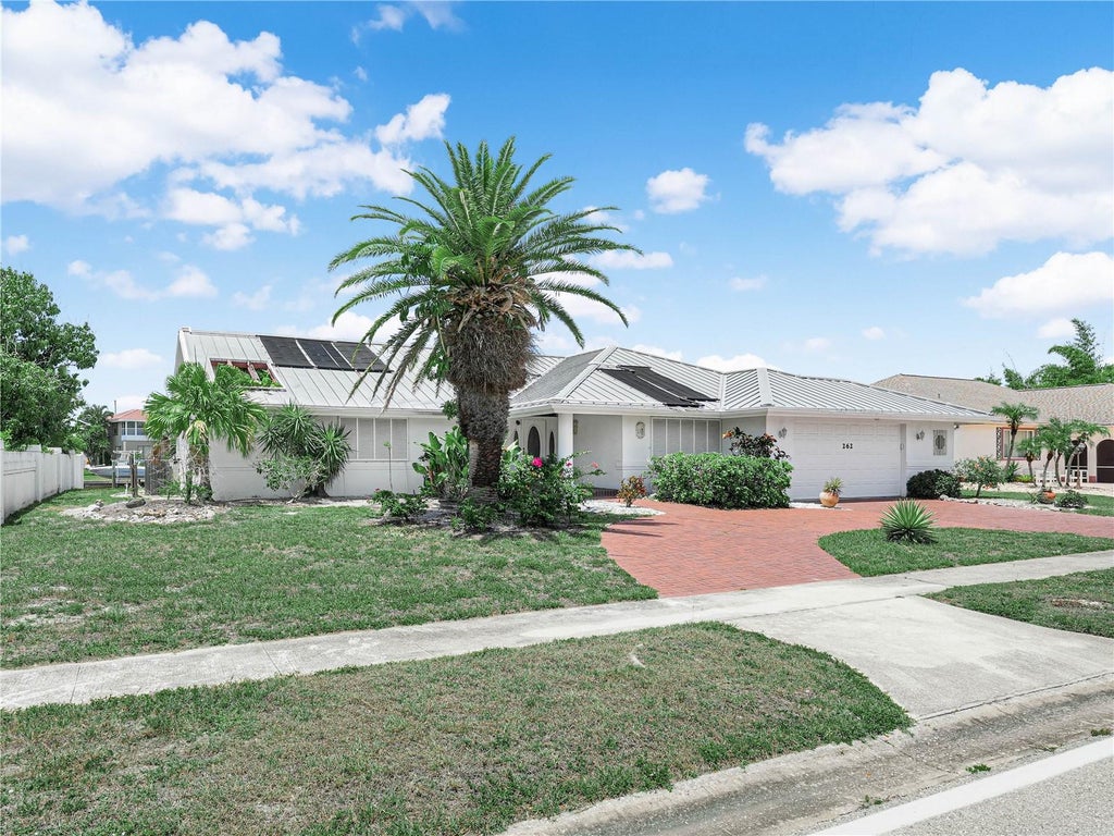 Photo of 262 George Road SE, Port Charlotte, FL 33952 (MLS # C7526440)