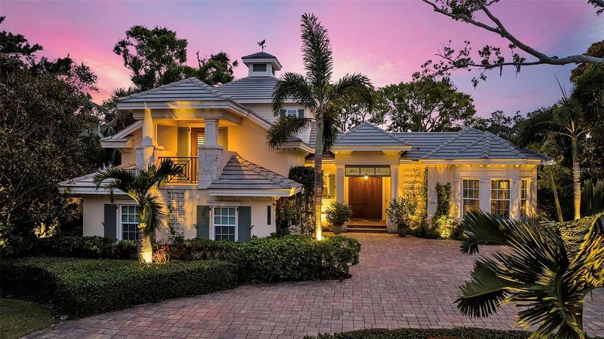 Rarely available in this coveted neighborhood, this exquisite property offers the best of Sarasota living with over 3,200 square feet of living space, sited on a third of an acre of lush landscape and seamless indoor-outdoor spaces, perfect for entertaining. Located in the heart of Southside Village, West of the Trail, this custom-built Todd Johnston home, completed in 2014, features luxurious upgrades throughout, blending modern design with the tranquility of a private sanctuary. As you enter the home, you're greeted by an exquisite tropical oasis - outdoor living and dining spaces, a private pool and a full summer kitchen. Once inside the home, the expansive great room with abundant natural light, soaring ceilings, and sliding glass doors that open directly to the pool and outdoor living spaces, create an ideal flow for entertaining. The chef's kitchen is a true highlight, with solid wood cabinets, granite countertops, and top-of-the-line stainless steel appliances—perfect for preparing gourmet meals. The main living floor is home to a private owner's suite, a serene retreat with ample space and a spa-like ensuite bathroom and a separate spacious office. Two additional bedrooms, a bonus room, and two full baths are located upstairs, offering privacy and comfort for family or guests. A separate guest house, complete with a bedroom and full bath, is perfectly positioned next to the pool and outdoor living area, providing a wonderful space for visitors or a quiet getaway. The home also features a three-car garage and carefully landscaped grounds, creating an inviting atmosphere both inside and out. The backyard is designed for ultimate relaxation and entertainment, with a sparkling pool, lush greenery, and a covered lanai area—ideal for outdoor dining, lounging, or hosting gatherings. The back of the home faces south, ensuring plenty of sunshine throughout the day. Located just steps from Morton's Market and the shops and restaurants of Southside Village, and only a short drive to downtown Sarasota and the area's world-class beaches, this home offers the perfect combination of luxury, convenience, and location. With its thoughtful design, premium finishes, and coveted location, this property is truly a gem in Sarasota, West of the Trail. Schedule your private tour today and experience all that this stunning home has to offer!