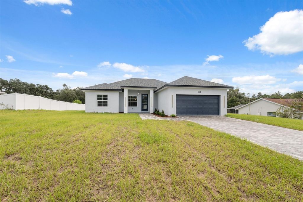 Photo of 136 Marion Oaks Golf Way, Ocala, FL 34473 (MLS # O6350538)
