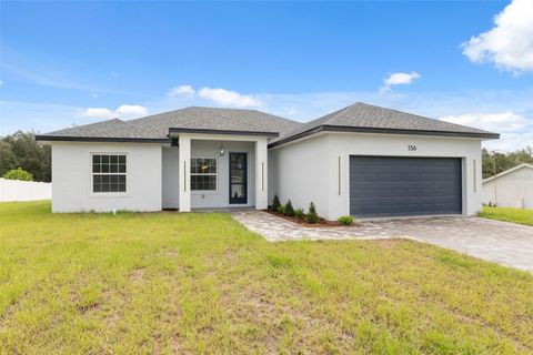 Photo of 136 Marion Oaks Golf Way, Ocala, FL 34473 (MLS # O6350538)
