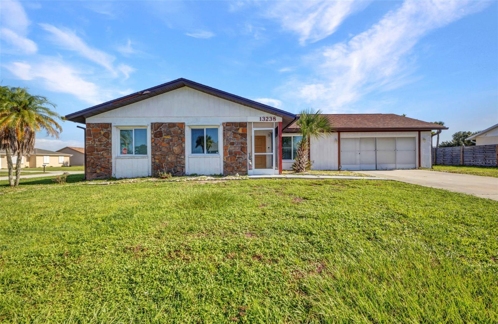 Welcome to your slice of paradise in the Gardens of Gulf Cove! This 3-bedroom, 2-bath pool home sits on an oversized corner lot & is move-in ready and full of great updates. Inside, you’ll find a freshly painted interior, updated bathrooms, with an open layout, and a kitchen with stainless steel refrigerator and stove—perfect for everyday living or entertaining. Step outside to your private, fenced-in pool area where you can relax, swim, or enjoy a quiet evening under the screened lanai. Big-ticket items are already taken care of: roof (2023), impact windows, A/C (2020), and electrical panel (2019). Located in a fun and friendly community with low HOA fees, you'll also have access to two community pools, tennis courts, a clubhouse, and more. Just a short drive to beaches, shopping, and dining—this is Florida living at its best!