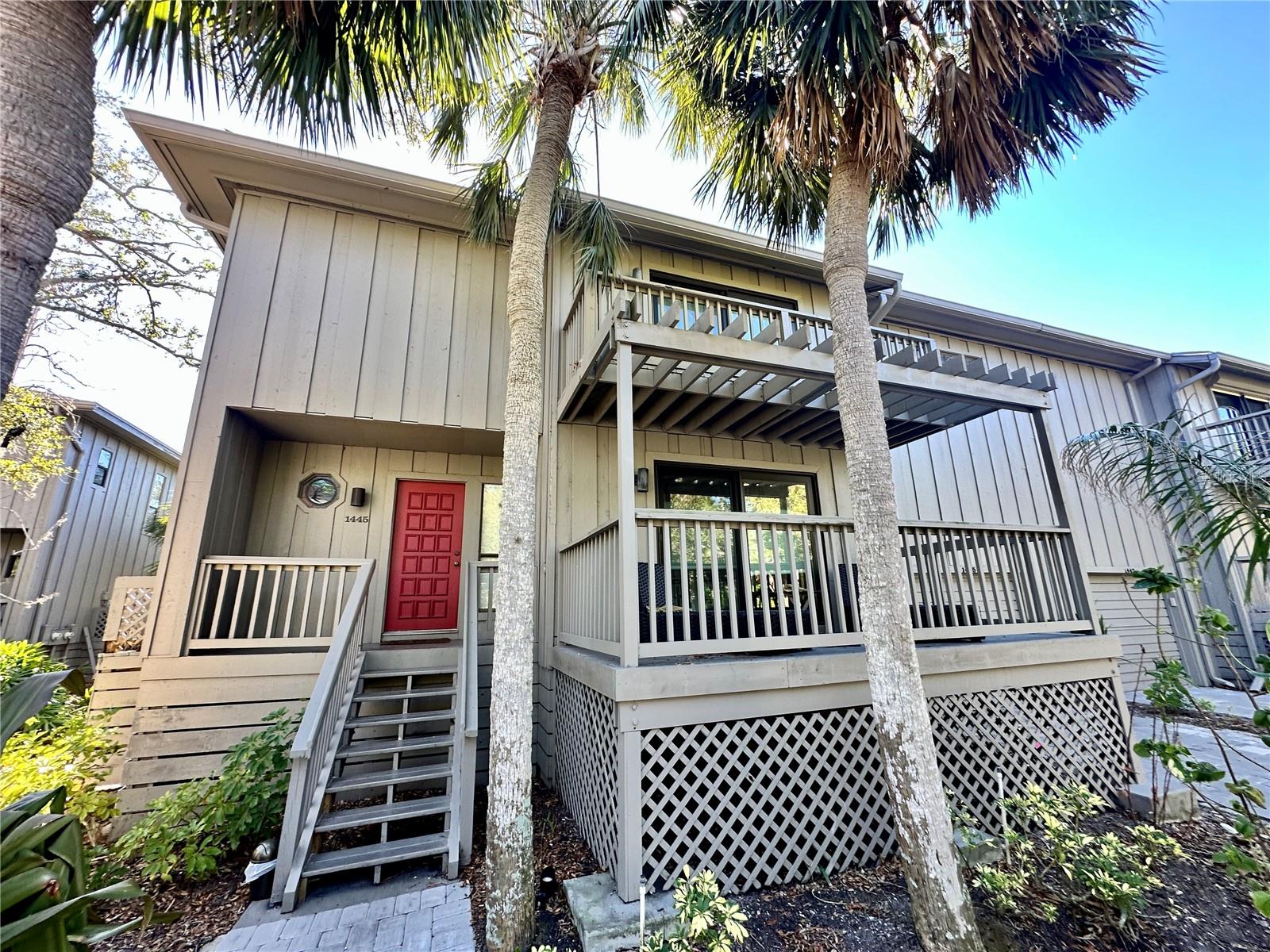 Freestanding Treehouse in the Landings being offered on an annual rental turnkey furnished with top of the line furniture. Nestled in the trees with lush vegetation and live oaks, this 3 bedroom unit has 2 1/2 baths and a one car garage plus an oversized outdoor terrace. The first living level has a multi-use space consisting of a dining room, living room, kitchen and guest bath. The private upstairs space consists of the owner's suite and two guest bedrooms sharing a full bath. The Landings is in close proximity to Siesta Key Beach, shopping, dining, arts district, downtown Sarasota, SRQ airport and Sarasota Memorial Hospital. The plaza just outside the community has a wonderful array of restaurants, Starbucks, fitness center, and Publix ... all a short stroll away. Enjoy the meandering nature trails, fishing at the pier on the Intracoastal Waterway or launch your kayak into the bay. Conveniently located adjacent to The Landings is a Phillippi Harbor Club, rackominium and marina, with easy access to the bay & Intracoastal Waterway for boating.