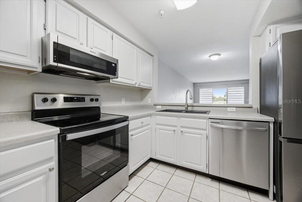 Photo of 13917 Fairway Island Drive #922, Orlando, FL 32837 (MLS # O6447143)