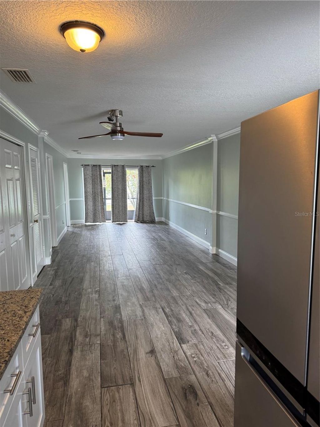 Photo of 313 Dirksen Drive #F7, Debary, FL 32713 (MLS # O6394054)