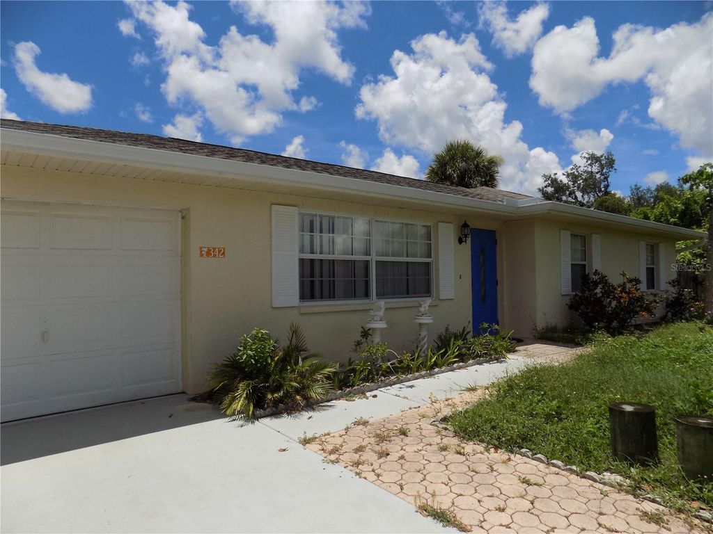 Photo of 342 Millport Street NW, Port Charlotte, FL 33948 (MLS # C7494892)