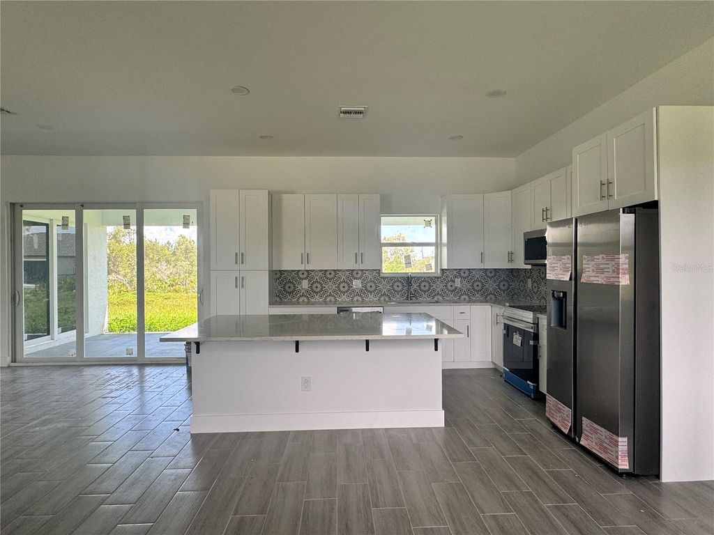 Photo of 14149 Whittier Lane, Port Charlotte, FL 33981 (MLS # D6142847)