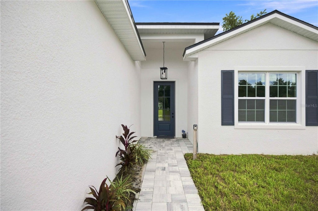 Photo of 162 W Romany Loop, Beverly Hills, FL 34465 (MLS # OM731744)