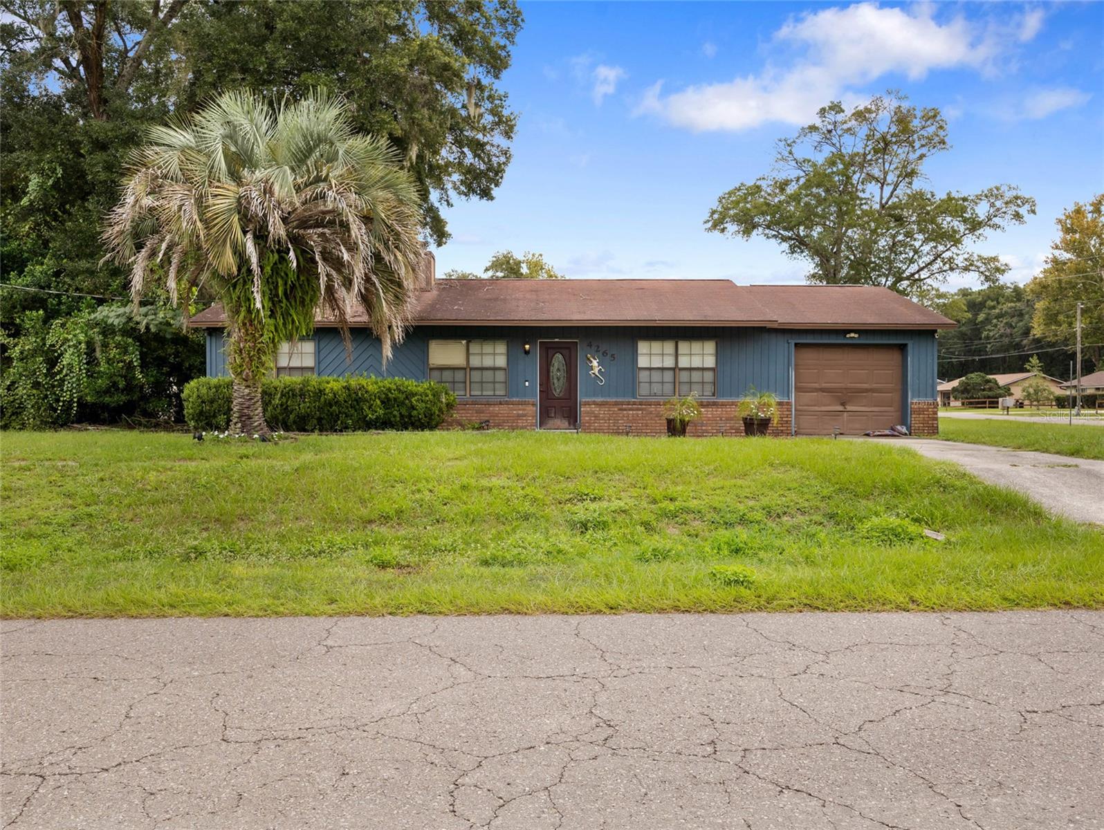 Investor Special!
3 Bedroom | 2 Bath | Ocala, FL
Priced to sell, this cute home is located close to shopping and is in a well established neighbirhood. Such a great opportunity for investors or buyers looking to add their personal touch. The split floor plan offers plenty of potential, with a cozy living room featuring wood-beamed ceilings and a wood-burning fireplace (currently set up with an electric insert). The galley kitchen provides a functional layout, ready for your updates.
Sitting on a large corner lot with a fully fenced backyard, this property offers both space and privacy. With some work and vision, this home could shine again.
Seller will be reviewing all offers—don’t miss your chance to bring this diamond in the rough back to life! CASH ONLY
