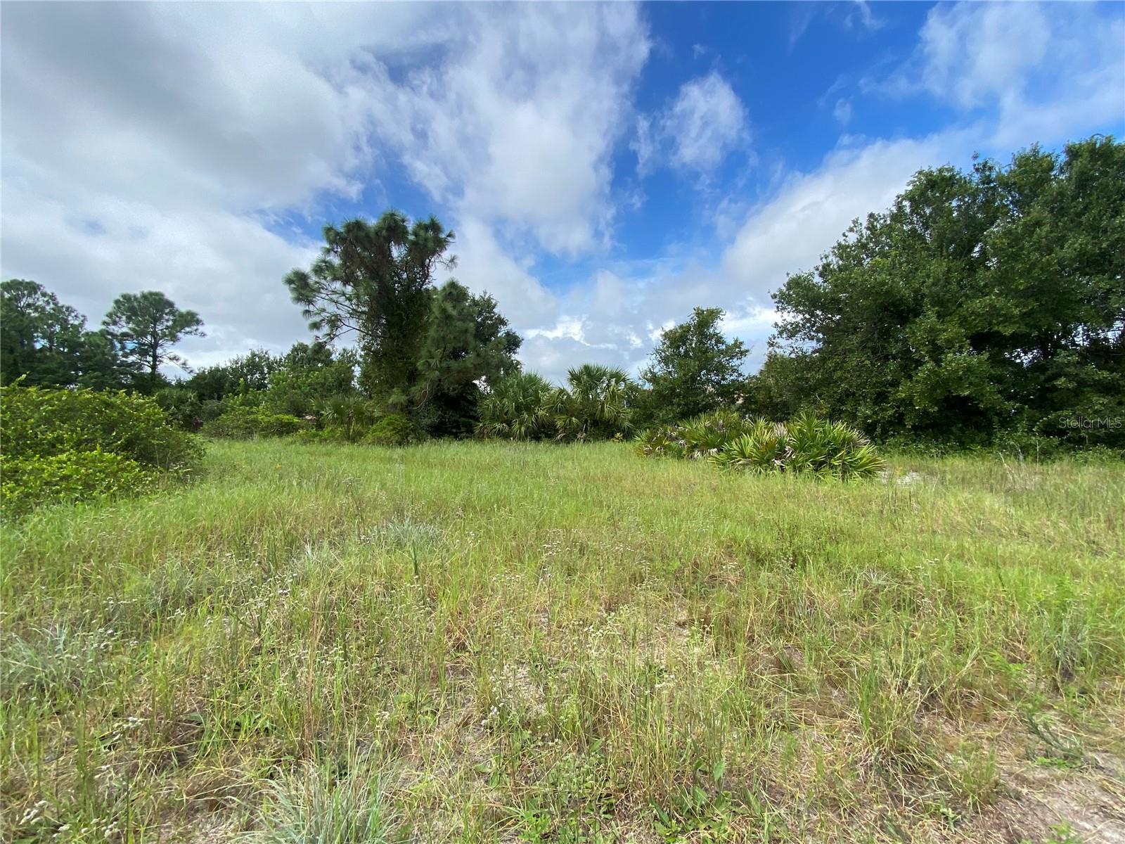 Discover this prime vacant lot in Harbour Heights, a vibrant non-deed restricted waterfront community in Punta Gorda, FL, free from HOA fees. Located in Flood Zone X500, this property offers peace of mind and is just minutes from shopping, dining, banking, and the stunning Gulf Coast beaches Charlotte Harbor and the Gulf of America. Perfect for building your dream home or as a savvy addition to self-directed IRAs, 401Ks, or investment portfolios. Enjoy nearby Harbour Heights Park, less than 2 miles away, featuring a boat ramp, docks, fishing, playground, tennis, volleyball, basketball courts, picnic areas, and BBQ grills. Conveniently positioned off I-75, midway between Fort Myers and Sarasota, with easy access to multiple golf courses and amenities. Builder information available upon request. Embrace the Southwest Florida lifestyle today!