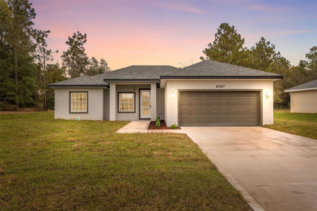 Photo of 6067 SW 155th Street Road, Ocala, FL 34473 (MLS # O6359626)